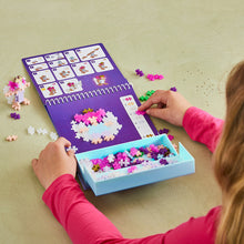 Load image into Gallery viewer, Child playing with a craft activity set on a beige surface