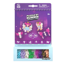 Load image into Gallery viewer, Purple packaging of a puzzle by number activity pad with colorful pieces inside.