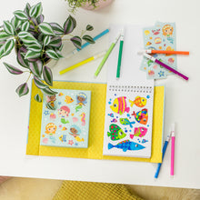 Load image into Gallery viewer, Tiger Tribe Mermaids Colouring Set – mermaid-themed stickers close-up – the outdoor kid.
