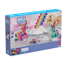 Load image into Gallery viewer, Box of Plus-Plus building set with unicorn and rainbow design on a white background
