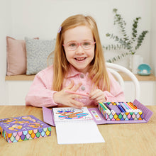 Load image into Gallery viewer, Tiger Tribe Colour by Numbers – Mermaids &amp; Friends – lifestyle shot of child colouring – the outdoor kid.
