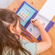 Load image into Gallery viewer, Tiger Tribe Pencil Art – Metallic Blend &amp; Shade – lifestyle shot of child colouring – the outdoor kid.
